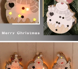 Close-up of LED glowing wooden Christmas ornaments featuring Santa, Snowman and Reindeer