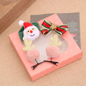 Set d'accessoires cheveux Noël avec chouchou Père Noël et pinces bois de renne