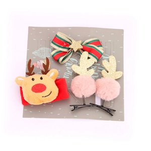 Coffret d'accessoires de Noël avec pinces renne et nœud festif sur carte de présentation