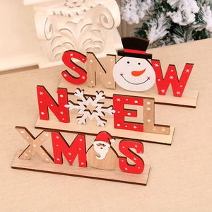 Decorazioni natalizie in legno dipinte con scritte SNOW NOEL e XMAS per tavoli
