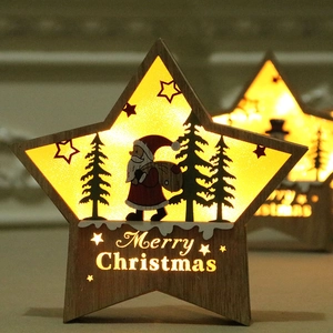 LED Stern aus Holz mit Weihnachtsmann-Silhouette und warm leuchtendem Schriftzug