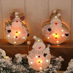 Nordic wooden glowing Christmas ornaments featuring Santa, deer, and snowman with LED lights