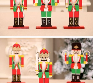 Detailed view of DIY wooden nutcracker soldier ornaments with red and green paint