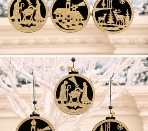 Gedetailleerde lasergesneden kerstversieringen met kerststallen en gouden glitters