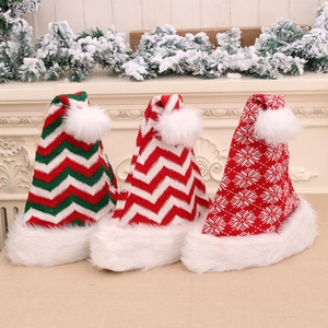Three premium knitted Christmas hats with plush pom-poms and snowflake patterns