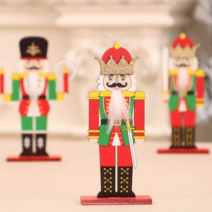 Nutcracker wooden Christmas DIY ornament with gold crown and red base for festive decor
