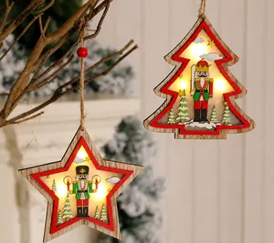 Hanging wooden Christmas star and tree ornaments with Nutcracker and LED warm light