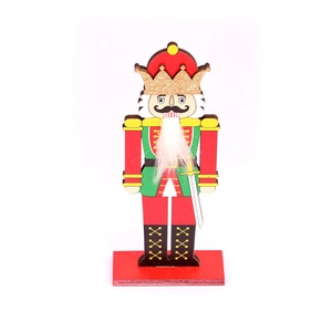 Nutcracker soldier wooden Christmas ornament with red and green uniform on white background