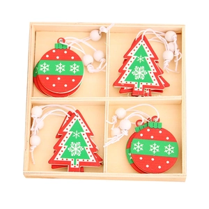 Christmas wooden pendant set with painted trees and balls in a wooden storage box