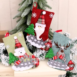 Three-piece linen Christmas stockings set with Santa, Polar Bear, and Reindeer 3D designs
