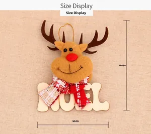 Detail of wooden reindeer pendant with Noel engraving and festive red plaid scarf