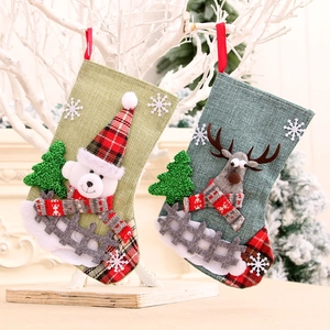 Linen Christmas stockings set featuring plush bear and reindeer with plaid accents