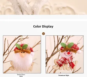 Detailed view of Santa and Snowman plush ornaments with wooden SNOW letters