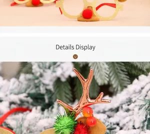 Detail display of Christmas antler glasses with gold sequins and red reindeer nose décor