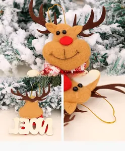 Detail of Christmas reindeer felt ornament with NOEL wooden letters and gold hanging string