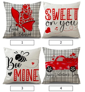 Set of four Valentine's Day pillow covers with heart truck and bee patterns on linen