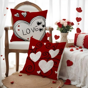 Set of two Valentine's linen pillowcases with red and white hand-drawn heart patterns
