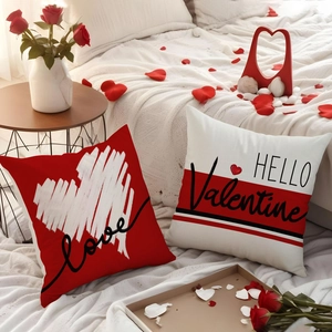 Valentijnsdag kussenhoezen in rood en wit met hartjesmotieven en liefdesteksten