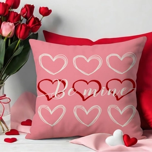 Pink Valentines Day pillow cover with heart patterns and Be Mine text for home decor
