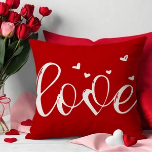 Red Valentine's Day love pillow cover with white lettering and tulip floral decor