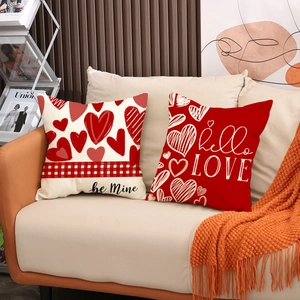 Valentine's Day red heart pillow cover set with be Mine and hello LOVE prints on sofa