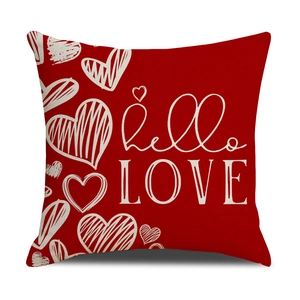 Detail of red Valentine pillowcase featuring hello LOVE print and heart patterns