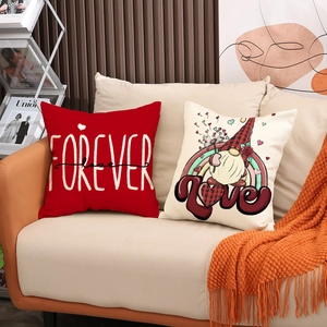 Linen love pillows with red Forever and gnome design on a cozy beige living room sofa