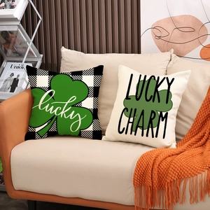 St. Patrick's Day linen pillow covers with lucky shamrock prints on a cozy sofa