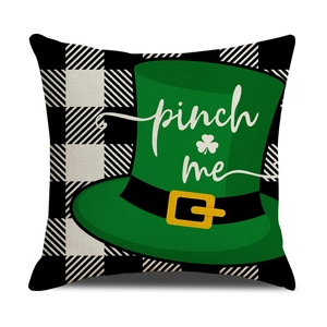 Detail of St. Patrick's Day pillow case with buffalo plaid and green leprechaun hat design