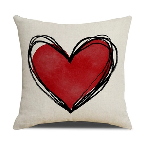 Detailed texture of square linen pillowcase featuring a red heart print and black outlines