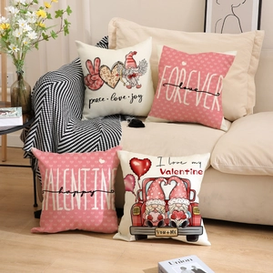 Cozy living room scene featuring four Valentine heart gnome decorative pillow covers on a sofa