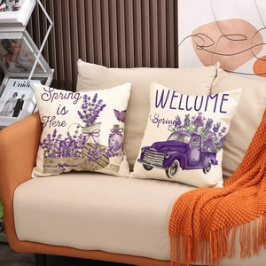 Lavender flower print linen pillow covers set of two on a modern cozy sofa