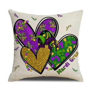 Mardi Gras pillow cover featuring festive heart patterns and fleur-de-lis on white linen