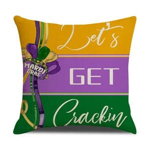 Detailed macro view of the linen Mardi Gras pillow cover with mask and letter print