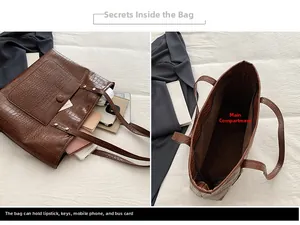 Detail view of large capacity dark brown crocodile pattern tote bag showing interior space