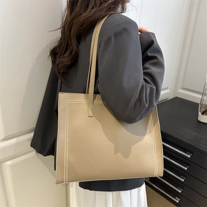 2025 Large khaki tote bag with lychee grain leather and white decorative stitching