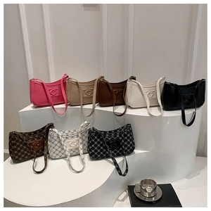 Detailed close-up showing eight stylish baguette bags with G-logo in varied colors and patterns