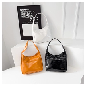 Three minimalist glossy faux leather shoulder bags in white, orange and black colors
