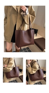 Detail of the dark brown leather tote bag with long shoulder straps for daily commute