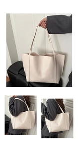 Detailed views of creamy white tote bag showing slim handles and side stitching accents