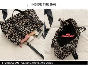 Detail view of the spacious leopard print tote interior showing capacity for daily essentials