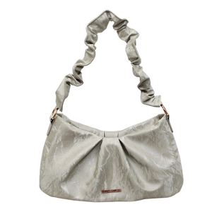 Minimalist light grey cloud style underarm bag with pleated texture and silver metallic finish