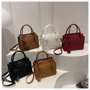 Variety of women's tote bags in multiple colors like brown, wine red and black