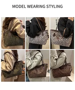 Vue détaillée des sacs cabas en toile à imprimé léopard avec anses en cuir en plusieurs coloris