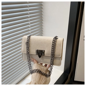Chic cream-white chain crossbody bag with metallic clasp and rivet details for women