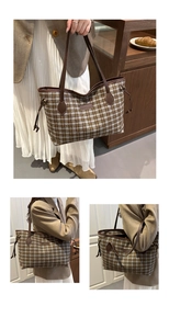 Detail of checkered knit tote bag with brown leather straps and stylish side drawstring
