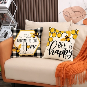 Nordic bee print pillow covers set with honeycomb patterns and Bee Happy typography