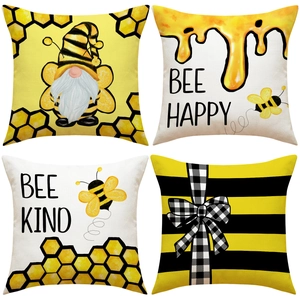 Detail of 4-pack honey bee gnome pillow covers with Bee Happy and Bee Kind prints