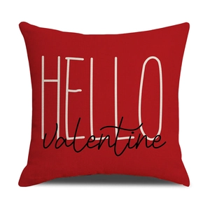 Detail of red Valentine cushion cover with HELLO text and fabric texture view