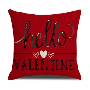 Close-up of red linen Valentine pillowcase with hello VALENTINE print and heart detail